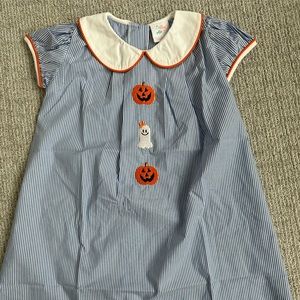 Halloween dress with tags on it! Stitchy Fish size 4t